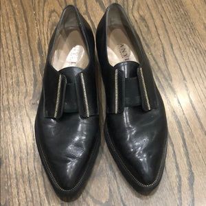 Black and gold pointed toe oxfords